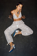 Silver Sequin Bra with adjustable straps, styled with matching sequin trousers and silver wedge sandals.