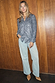 Gunmetal Sequin Miley Shirt with silver sequins and blouson sleeves, styled with light wash denim jeans.