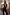Thumbnail for Black Sequin Jumpsuit with a square neckline and shimmering finish, captured in a studio mirror selfie.