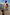 Thumbnail for Silver Sequin Maxi Wrap Jaspre Skirt worn by a model against a white architectural backdrop.