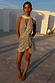 Silver Sequin Mini Jaspre Skirt and matching sequin top styled for a shimmering party-ready vacation look.