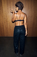 Black Sequin Bra with lace trim and adjustable straps, styled from the back with matching sequin trousers.