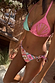 Mixed Tile Tie Side Brief in an in-house print, paired with a pink and teal beaded shell bikini top for a vacation look.