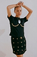 Black Shell Boob Tee and Crochet Shell Wrap Skirt with gold shell embellishments on a size 8 model.