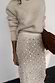 Thumbnail for Cream Shells Dorris Skirt with pearlescent shell beads and glass embellishments, worn with a fuzzy knit sweater.