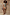 Thumbnail for Shell Mini Wrap Dress in an abstract blue and orange print with metallic details and flutter sleeves on a model.