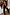 Thumbnail for Black Shell Elissa Trousers with a gold seashell print and wide-leg fit, styled for a vacation look.
