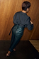 Bottle Green Ruffle Miley Shirt featuring an embroidered back neck logo and blouson sleeves, shown from behind.