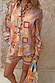 Dolce Vita Ellie Shorts in a multi-coloured tile patchwork print, styled as a co-ord with a matching shirt for vacation.