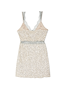 Silver Sequin Mini Mimi Dress featuring a v-neckline and waist with delicate lace trim, shown against a white background.