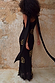 Black and Gold Simona Sequin Maxi Dress featuring gold motifs and a multi-wear detachable scarf.