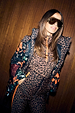 Night Garden Ski Jacket with padded poppy and leopard print motifs, layered over a matching leopard ski suit.