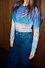 Ski Slopes Mesh Long Sleeve Top with a blue mountain landscape print and sheer finish, paired with dark denim jeans.