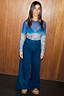 Ski Slopes Mesh Long Sleeve Top in sheer blue mountain print, styled with dark denim wide-leg jeans.