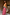 Thumbnail for Pink Snake Balloon Trouser with dusky pink snake and swirl motifs, styled with a colourful patterned top.