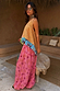 Pink Snake Balloon Trouser with dusky pink snake and swirl motifs, styled with a colourful patterned top.