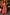 Thumbnail for Pink Snake Balloon Trouser in dusky pink with red snake motifs and a balloon silhouette, styled with a patterned top.
