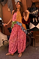 Pink Snake Balloon Trouser in dusky pink with red snake motifs and a balloon silhouette, styled with a patterned top.