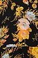 Thumbnail for Black Sofia Mini Tea Dress detail highlighting the intricate orange and yellow floral print on a black base.