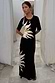 Black Sol Dorris Skirt featuring a cream hand-painted sun print, styled as a co-ord with a matching top.