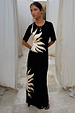 Black Sol Dorris Skirt featuring a cream hand-painted sun print, styled as a co-ord with a matching top.