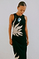 Black Sol Tank Top featuring a hand-painted sun print, styled with a matching skirt and silver jewellery.