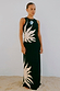 Black Sol Tank Top with a hand-painted sun print, styled with a matching maxi skirt in a beach setting.