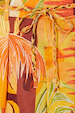 Verano Tate Shorts detail highlighting the tropical sun and palm print with a braided tie waist belt.