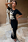NFD Black Sol Rib T-Shirt with a cream hand-painted sun print, styled as a co-ord with a matching skirt.