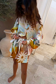 Abstract Soleil Ellie Shorts with sun motifs and a drawstring waist, styled as a multicoloured co-ord.