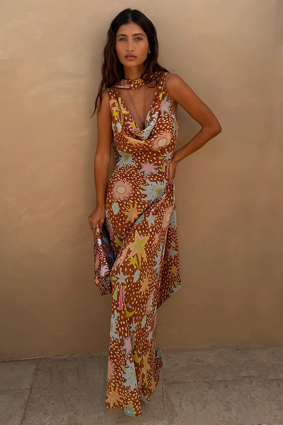 brown never fully dressed Check out our newest arrival, the Tilly Dress by Never Fully Dressed! , This effortlessly chic piece offers comfort while beautifully defining your figure. , With its super stretchy fabric, we