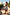 Thumbnail for Blue Starburst Bandeau Swimsuit with ruched side ties, worn by a woman holding hands with a child on a beach vacation.