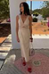 Thumbnail for Stone Mimi Dress in cream ramie-cotton features lace trim and waist cut-outs, styled for a summer vacation.