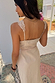 Stone Mimi Dress in cream with lace trim and back cut-out details for a summer vacation style.