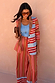 Multi Stripe Blazer in red and blue satin with a longline fit, paired with matching trousers and a blue top.