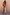 Thumbnail for Multi Stripe Blazer with a bold red and blue longline silhouette and satin-esque finish, styled with clashing prints.