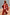 Thumbnail for Multi Stripe Blazer in red and blue, styled with a matching neck-tie top and trousers for a London street style look.