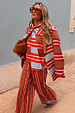 Multi Stripe Blazer in red and blue, styled with a matching neck-tie top and trousers for a London street style look.