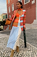 Longline Multi Stripe Blazer with red and blue stripes, styled with a mixed print dress on a cobblestone street.