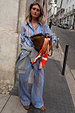 Blue cotton stripe jogger with red pinstripes and matching shirt, styled with a grey sweater and leopard print shoes.