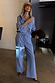 Blue Cotton Stripe Jogger with red pinstripes, featuring an elasticated tie waistband and a wide-leg structure.