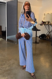 Blue Cotton Stripe Jogger styled as a co-ord with matching shirt, featuring red pinstripes and leopard print heels.