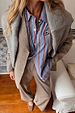Blue Cotton Stripe Miley Shirt with red pinstripes, layered with a checked blazer and grey knit for a London look.
