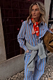 Blue Cotton Stripe Miley Shirt with red pinstripes, styled with matching trousers and a grey jumper for a London look.