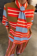 Multi Stripe Tank Top in tan and red knit, layered over a striped shirt for feel good dressing.