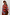 Thumbnail for Multi Stripe Tank Top in tan and red soft touch knit, layered over a striped shirt for a London look.