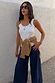 White Studded Rib Vest with gold stud detailing, styled with wide-leg jeans and a camel knit layer.