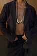 Chocolate Suede Jacket with notched lapels and buttoned cuffs, styled with gold jewellery for a premium London look.
