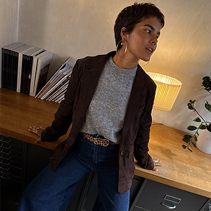 Chocolate Suede Jacket in brown, styled with a grey knit and leopard belt for a transeasonal office look.
