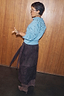 Thumbnail for Chocolate Suede Jaspre midi wrap skirt paired with a blue studded jumper and brown suede boots.
